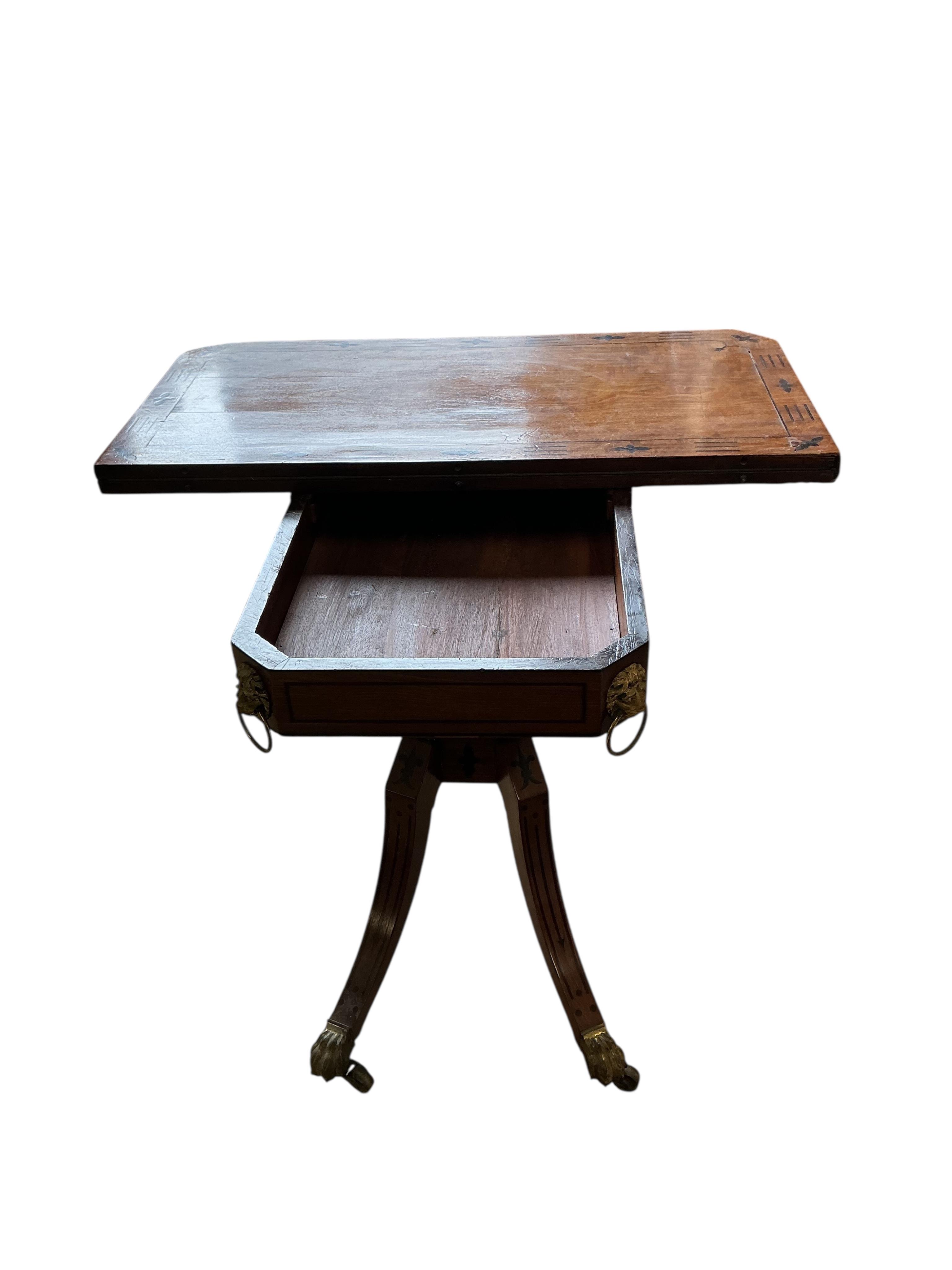 A Regency ebony inlaid rectangular mahogany folding card table, width 91cm, depth 45cm, height 74cm